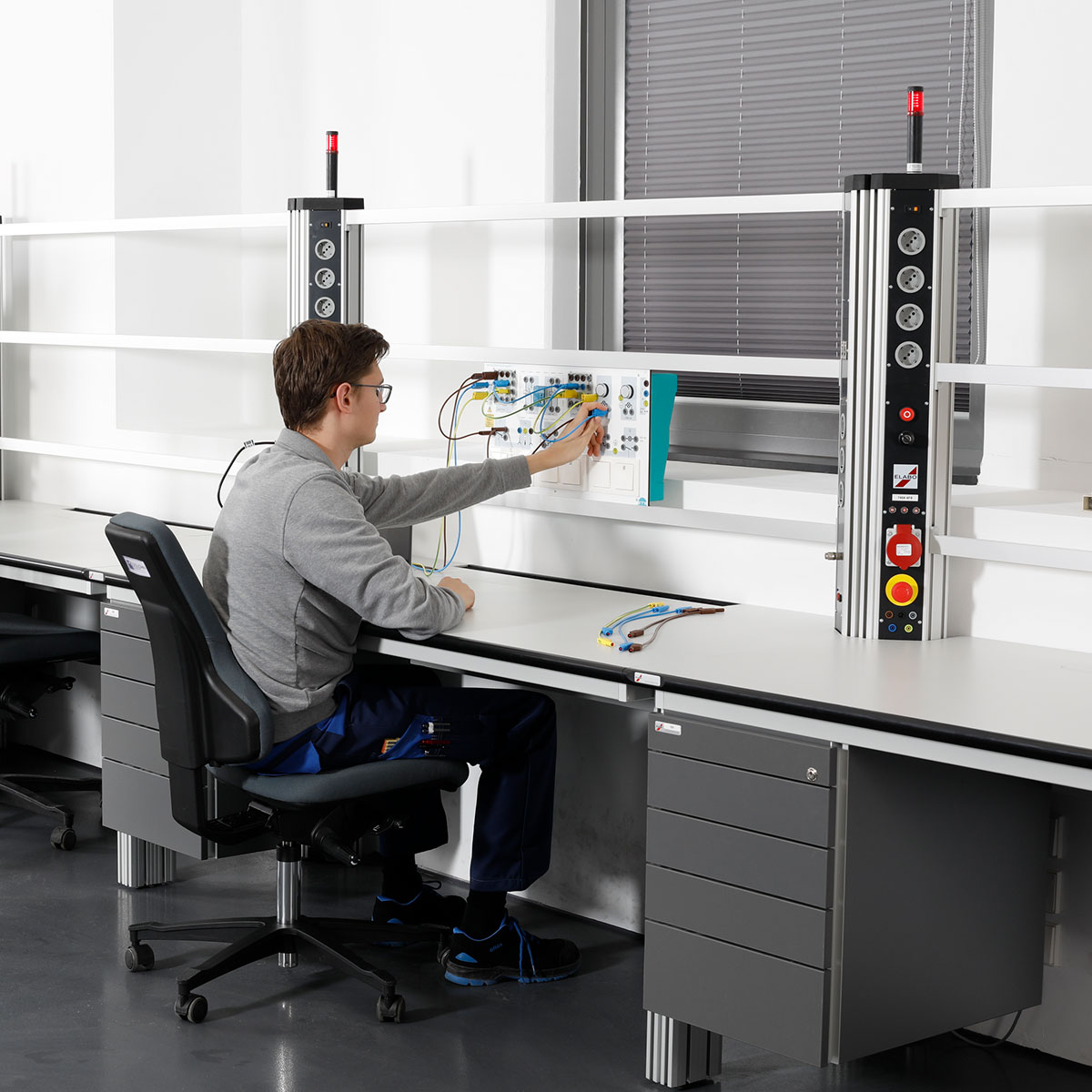 Student is working at the bott electrical laboratory training workshop