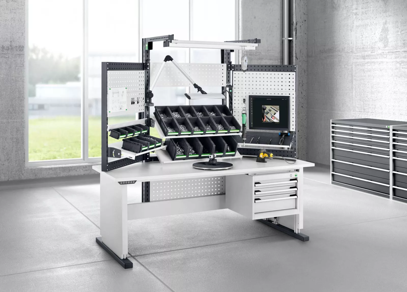 workplace storage solution - workstation with boxes for small parts storage, perfo panels and custom shelving