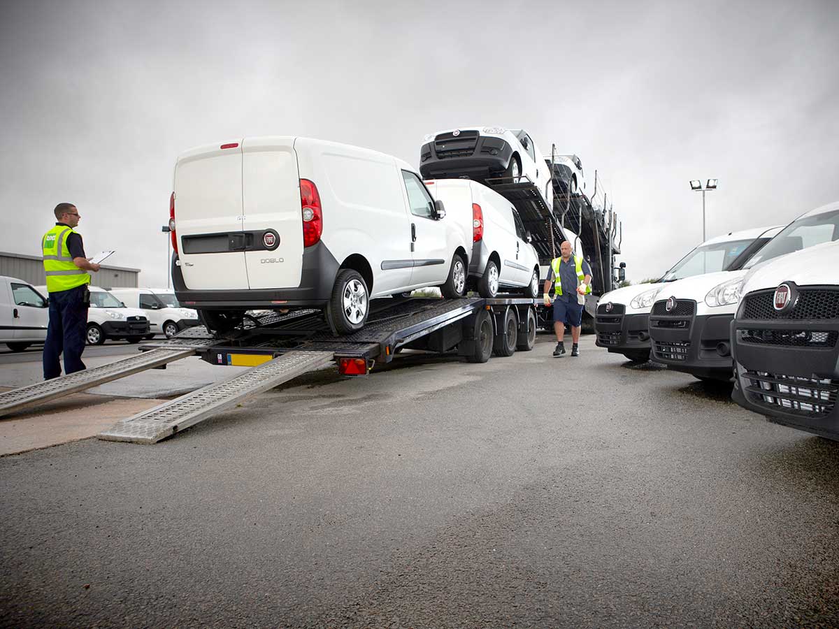 Fully equipped fleet vehicles are delivered to the customer.